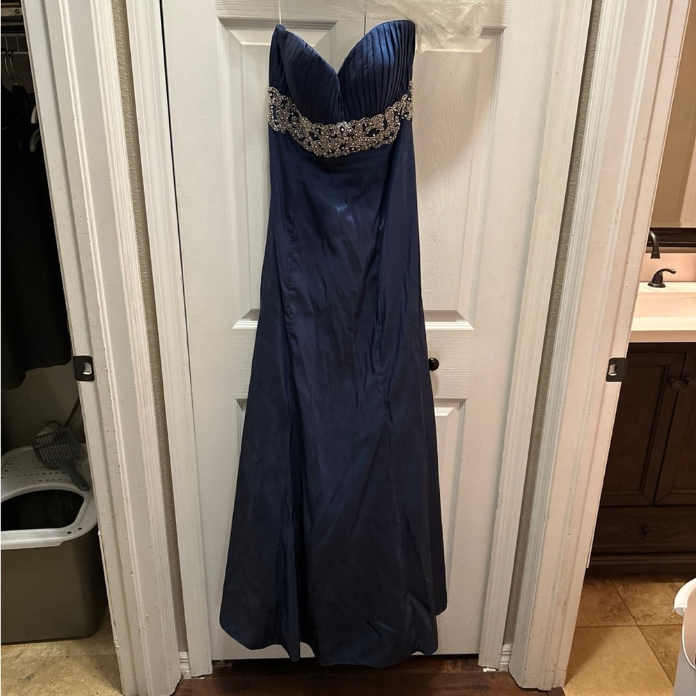Beautiful blue size 8 gown with silver beading
